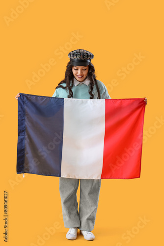 Young Asian woman with flag...