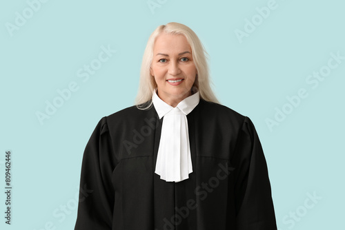 Mature female judge on blue...