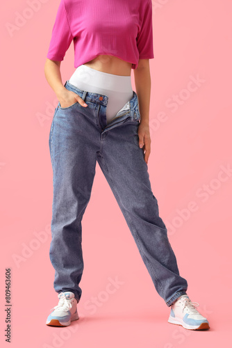 Young woman in stylish jean...
