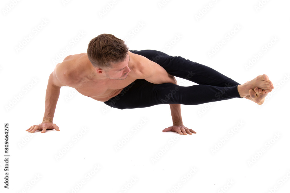 A young attractive man warms up before bray dance. White background. A young attractive man warms up before bray dance. White background.