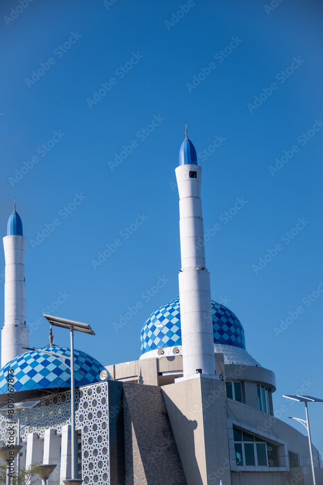 Amirul Mukminin Mosque, a floating mosque, is located at Losari Beach. A beautiful blue sky on the beach.