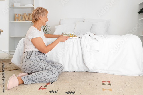 Mature woman with herbs for...
