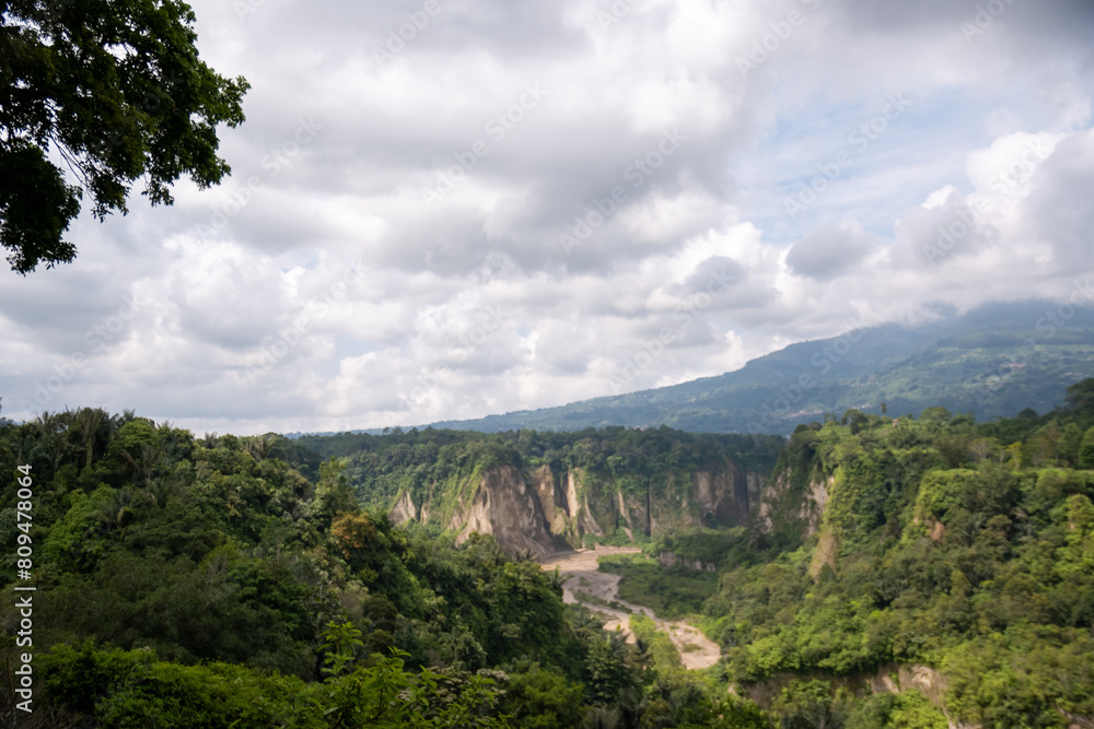 Ngarai Sianok, or Sianok Canyon, is the most beautiful scenery and the favorite tourism place in West Sumatera, located between Bukittinggi City and Agam Regency. Ngarai Sianok, or Sianok Canyon, is the most beautiful scenery and the favorite tourism place in West Sumatera, located between Bukittinggi City and Agam Regency.