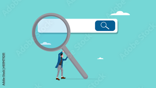 search new job or information, find career opportunity, businessman directs big magnifying glass on search bar