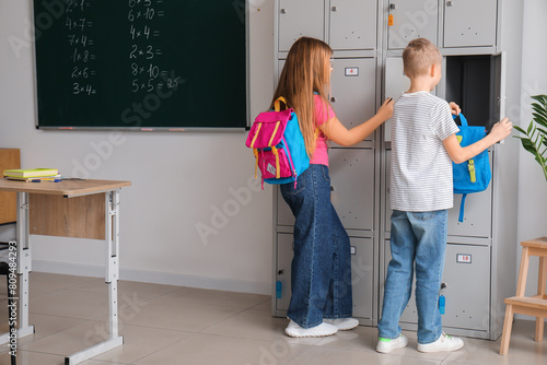 Little pupils near locker i...