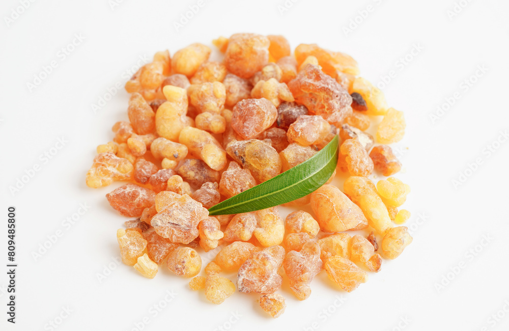 Frankincense or olibanum aromatic resin isolated on white background used in incense and perfumes. Frankincense or olibanum aromatic resin isolated on white background used in incense and perfumes.