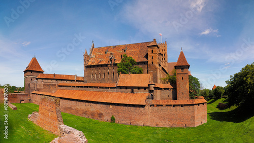 Castle in Malbork, Poland, fragment, on the right bank of the Nogat River, built in several stages from 1280 to the middle 15th century by the Teutonic Order. photo