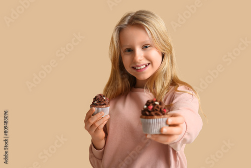 Cute little girl with tasty...