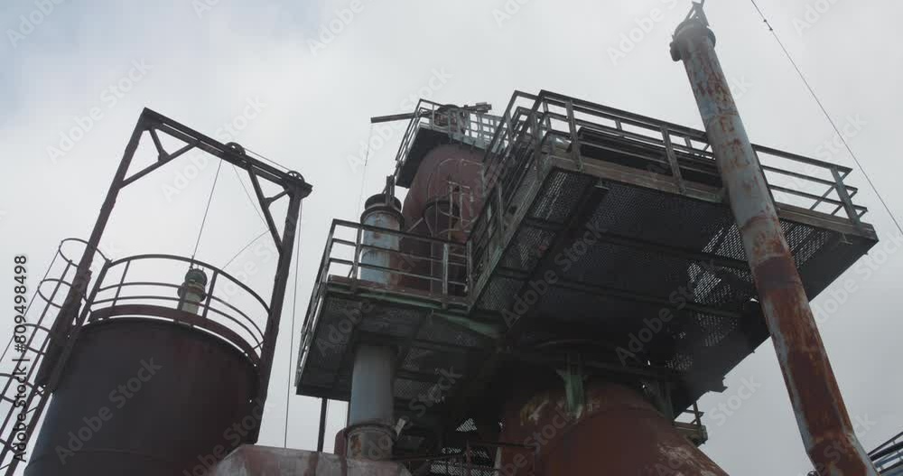 Low angle shot of the preserved structures at Völklinger Hütte Ironworks in Germany, a UNESCO World Heritage Site Low angle shot of the preserved structures at Völklinger Hütte Ironworks in Germany, a UNESCO World Heritage Site