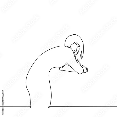 woman stands leaning forward leaning on crossed elbows and turned around and looks at the camera - one line art vector. concept lonely woman standing, hunched back