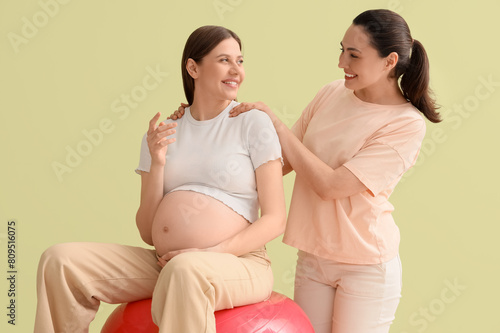 Young pregnant woman with d...