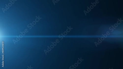 Anamorphic blue highlights with alpha channel move from top to bottom. Highlights on a black background, with background replacement.