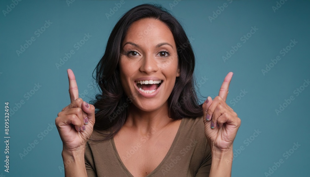 Portrait of nice astonished person open mouth direct fingers up empty space proposition isolated on blue color background Portrait of nice astonished person open mouth direct fingers up empty space proposition isolated on blue color background