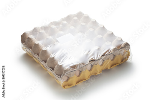 Fresh eggs in cardboard tray isolated on white background