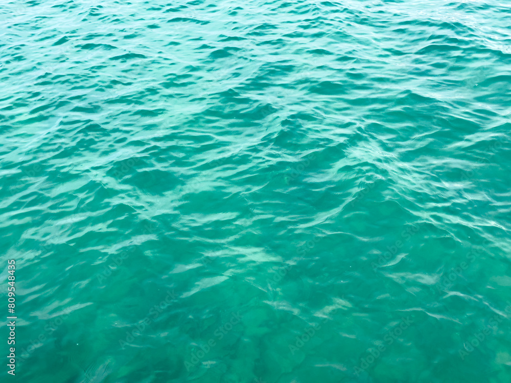 Fototapeta premium Turquoise water texture. Summer concept.
