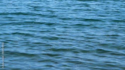 Smooth Swaying Of Waves. Beautiful And Fresh Blue Wavy Water. Calming Effect Of Water Movement. Close up.