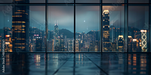 Office courtyard we see through the window the towering buildings and lights, at night