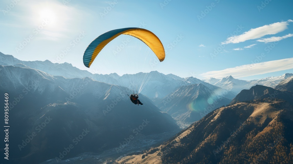 Paraglider flying over the mountains. Paraglider flying over the mountains.