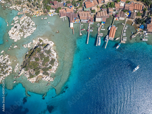 The ancient city of Simana, founded by the Lycian civilization, the sunken city of Kekova, rock tombs, castle, sea and nature reveal its magnificence. photo