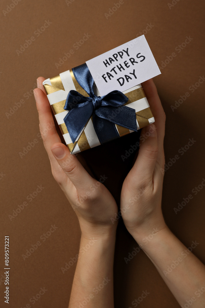 Father's day concept, gifts and greetings, on a brown background. Father's day concept, gifts and greetings, on a brown background.