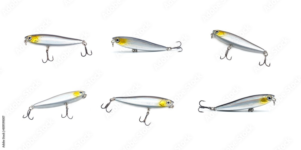 Set of illustrations. Collection of silver fish shaped plug lures with slight gold sparkles and 3-way hooks. Fishing equipment isolated on white background. Set of illustrations. Collection of silver fish shaped plug lures with slight gold sparkles and 3-way hooks. Fishing equipment isolated on white background.