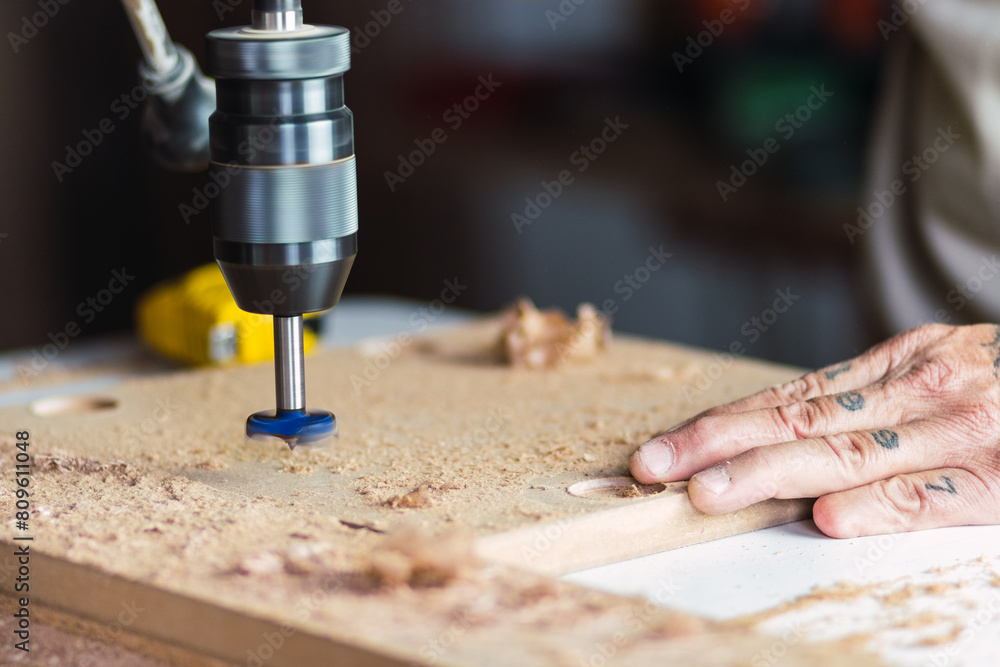 Wood drill in action close up Wood drill in action close up