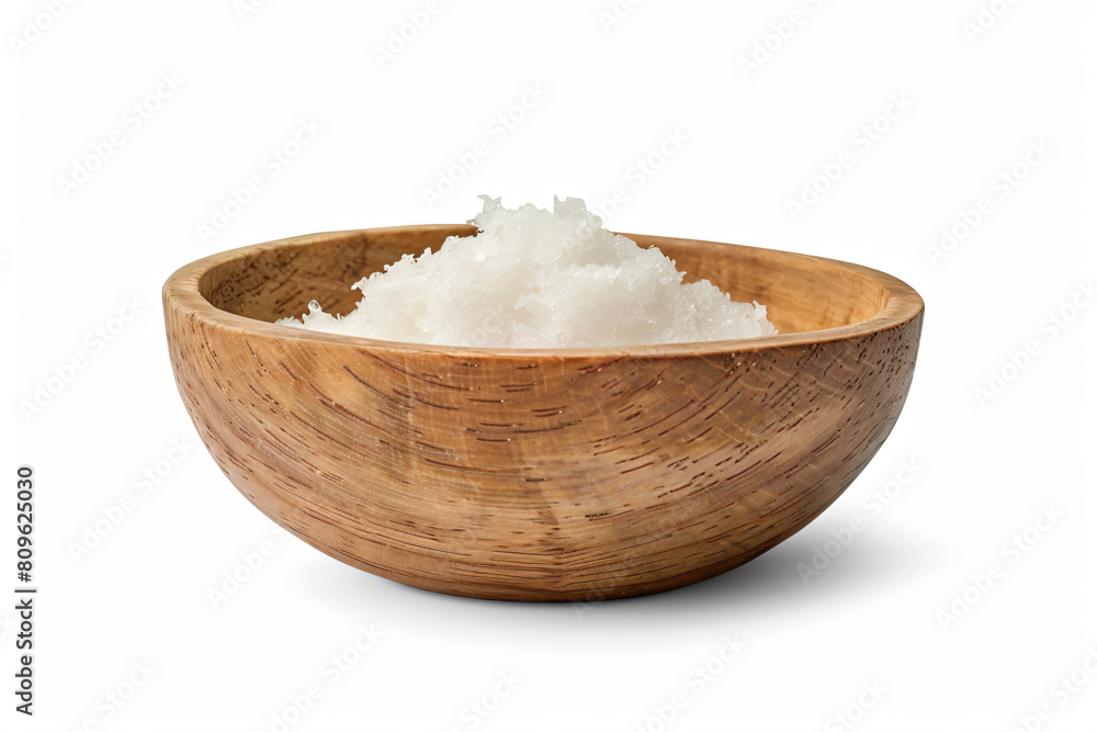 a wooden bowl filled with white rice on a white surface a wooden bowl filled with white rice on a white surface