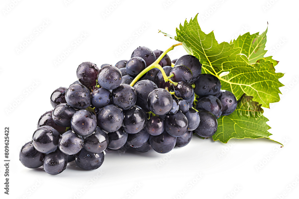 Fototapeta premium a bunch of grapes with a leaf on a white surface