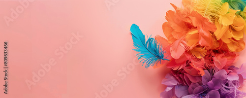 A colorful arrangement with a pink background, pride symbolic color