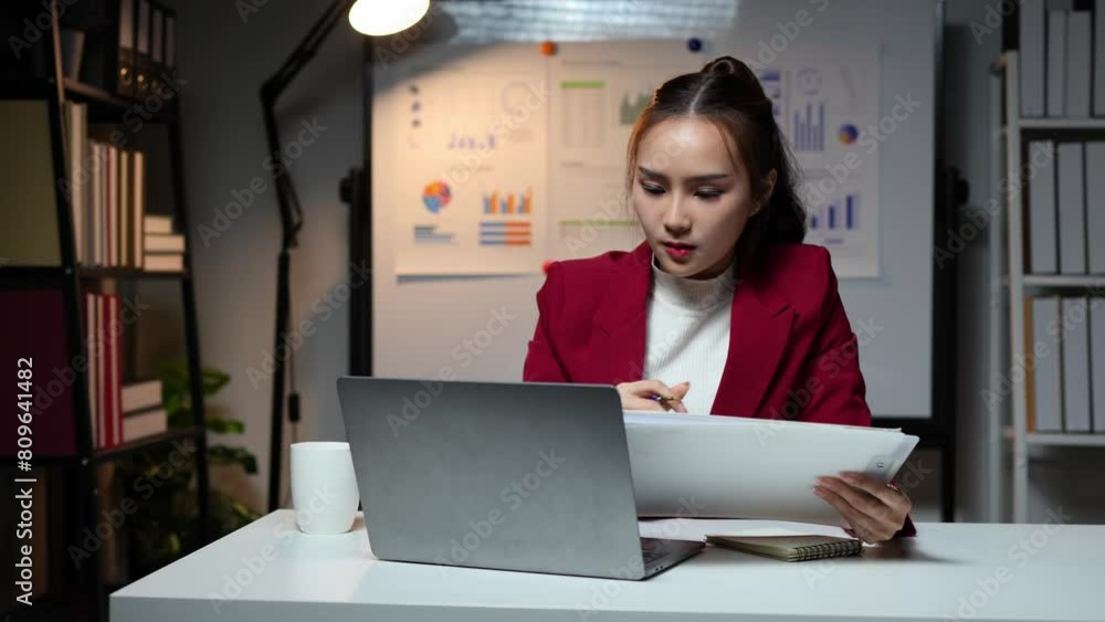 Asian businesswoman, self-employed working on laptop computer typing e-commerce marketing financial report on real estate project in office management concept. Asian businesswoman, self-employed working on laptop computer typing e-commerce marketing financial report on real estate project in office management concept.