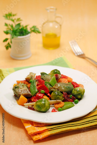 Stir fried vegetables with ham and peppers.