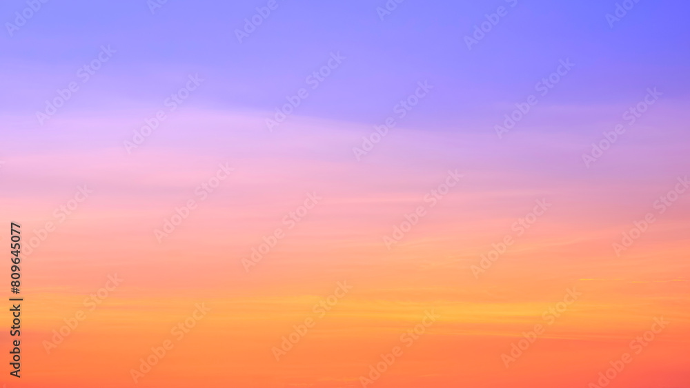 Idyllic sunrise sky background in light colorful tone with thin clouds on beautiful romantic morning horizon sky Idyllic sunrise sky background in light colorful tone with thin clouds on beautiful romantic morning horizon sky