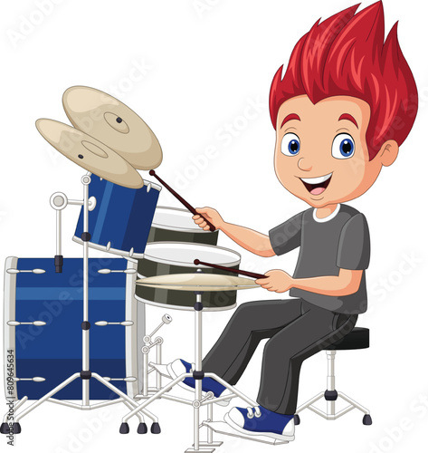 Little boy playing a drum set (ID: 809645634)