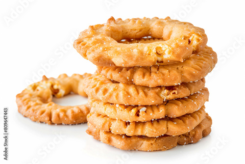 a stack of cookies with a bite taken out of one