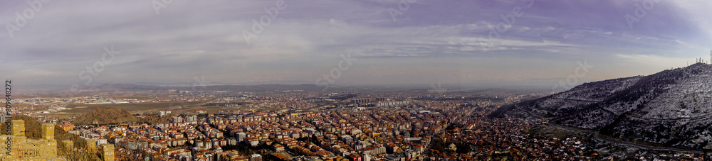 Fototapeta premium 4 February 2024 Afyonkarahisar Turkey. Afyonkarahisar castle and Afyon cityscape from castle on a cloudy winter day