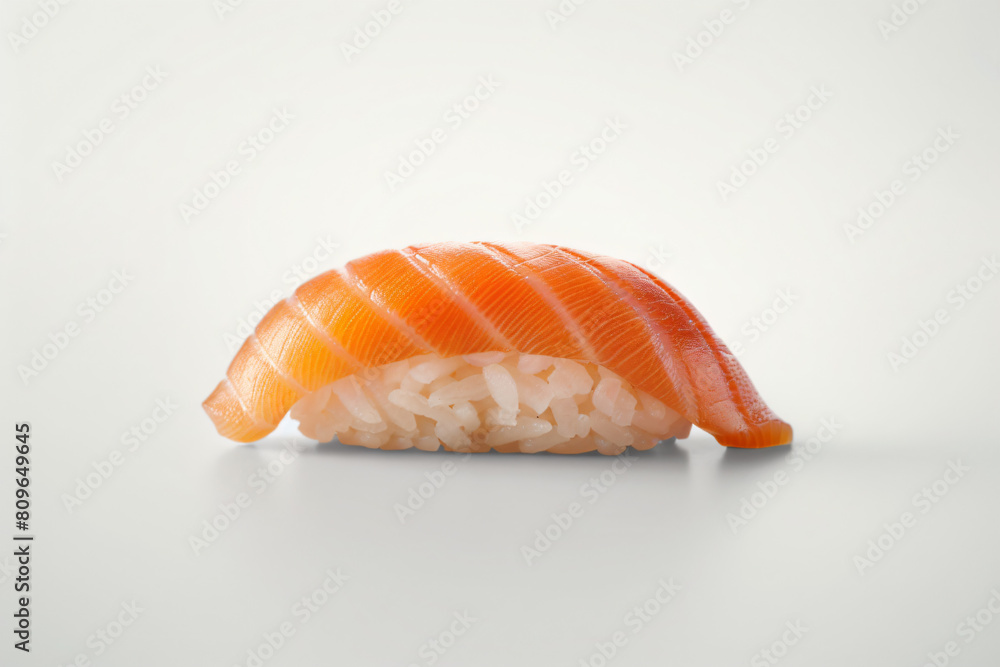 a piece of sushi sitting on top of a table a piece of sushi sitting on top of a table