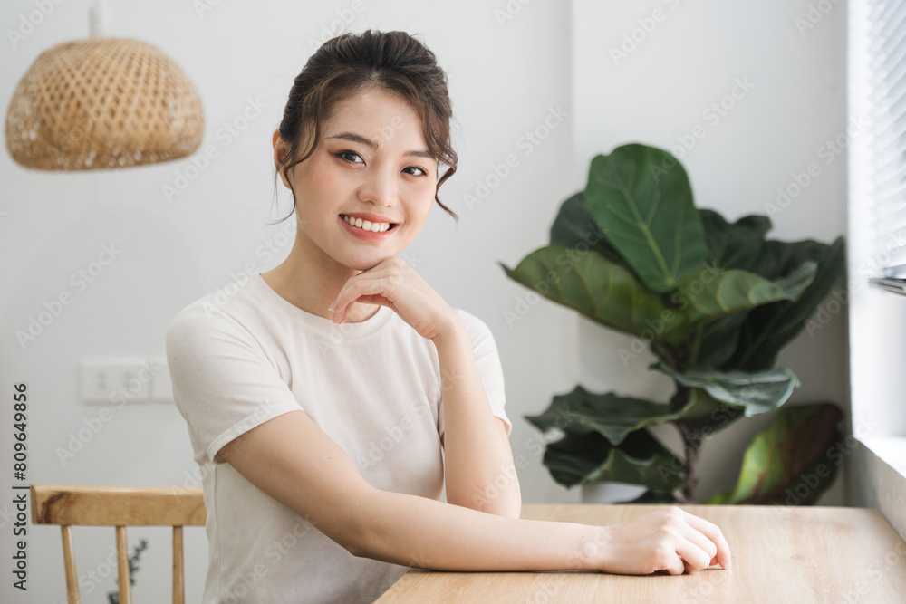 Portrait of beautiful young Asian girl at home Portrait of beautiful young Asian girl at home