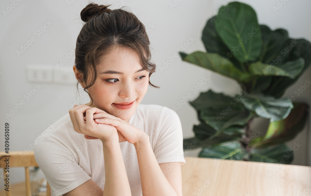 Portrait of beautiful young Asian girl at home Portrait of beautiful young Asian girl at home