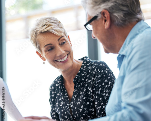 Mature woman, smile and estate agent in house for discussion, deal and pleased with information about sale. Female client, man and contract or paperwork for retail, planning and advice or consulting
