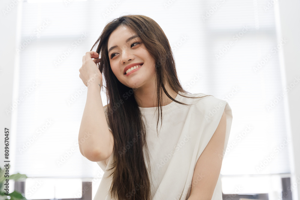 Portrait of beautiful young Asian girl at home Portrait of beautiful young Asian girl at home