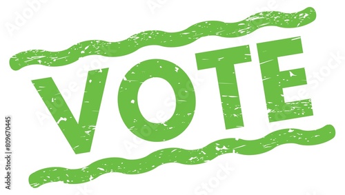 VOTE text on green lines stamp sign. photo