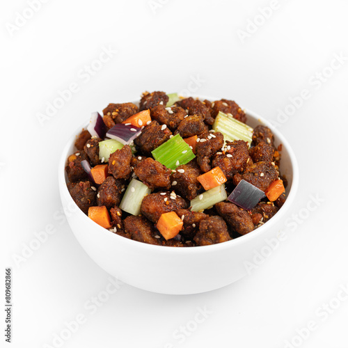 Crispy fried lamb with vegetables, Chinese food, on a white background, isolate photo