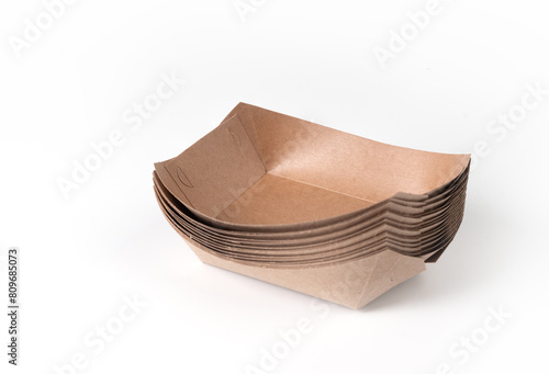 Recycled paper trays for snacks, isolated on a white background photo