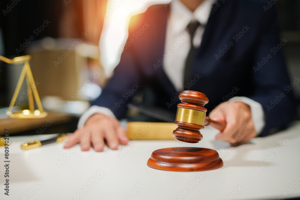 judge on wooden table And experienced lawyers meet with clients and give advice behind the scenes. legal services legal consulting concept judge on wooden table And experienced lawyers meet with clients and give advice behind the scenes. legal services legal consulting concept