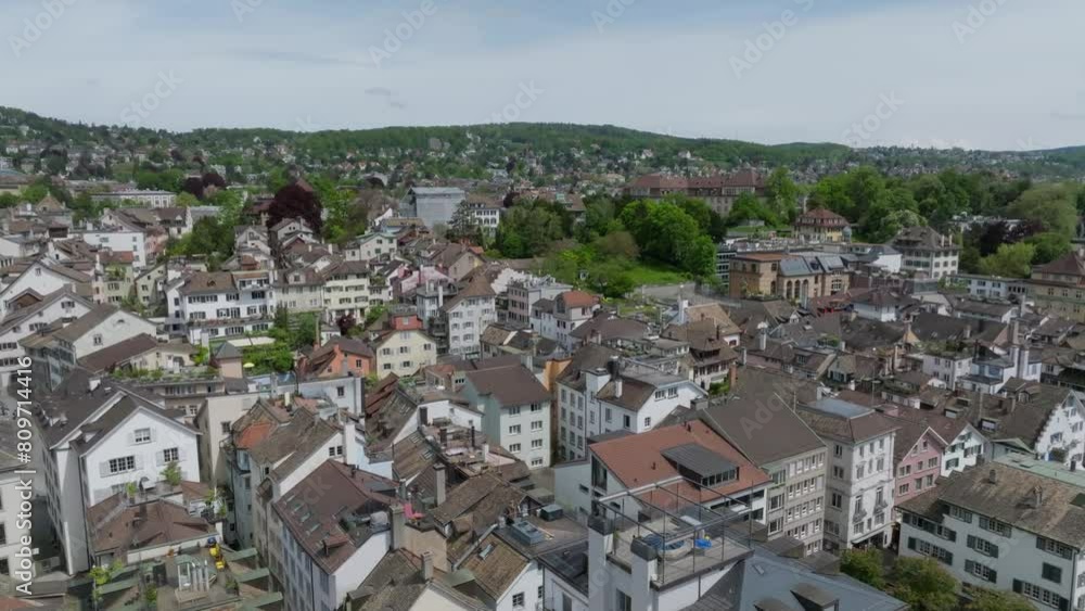 Slow left-moving drone shot of Zurich city, showing old town architecture. Slow left-moving drone shot of Zurich city, showing old town architecture.