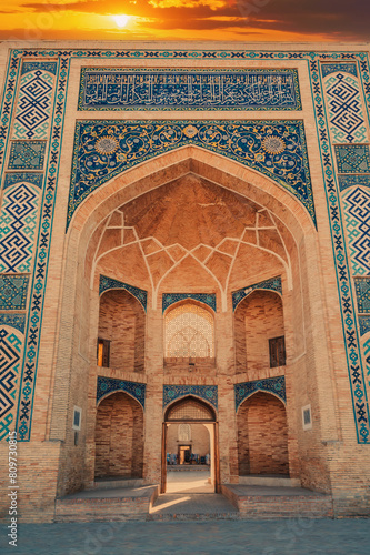 entrance portal decorated ceramic tiles with traditional uzbek ornament islamic pattern of ancient Muslim madrasah of Barak Khan. Hazrati Imam Architectural Complex in Tashkent, Uzbekistan photo
