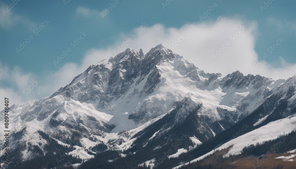lose up view of snow-capped rocky mountain peak and blue open sky background
lose up view of snow-capped rocky mountain peak and blue open sky background