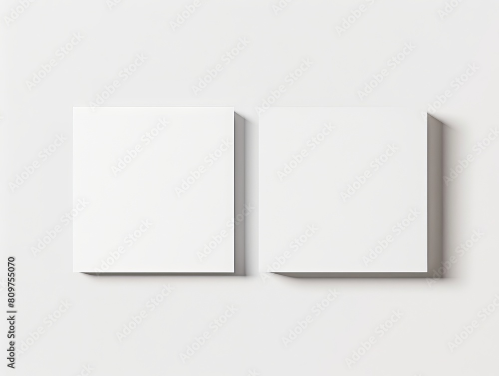 Two white blank cards on a white surface. Two white blank cards on a white surface.