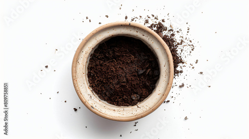 Cup with spent coffee grounds for fortune telling on white