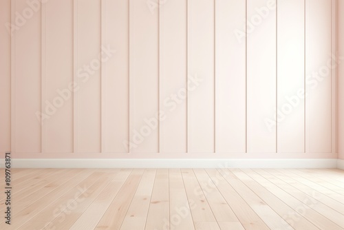 A pink wall with a white baseboard and a light wooden floor.